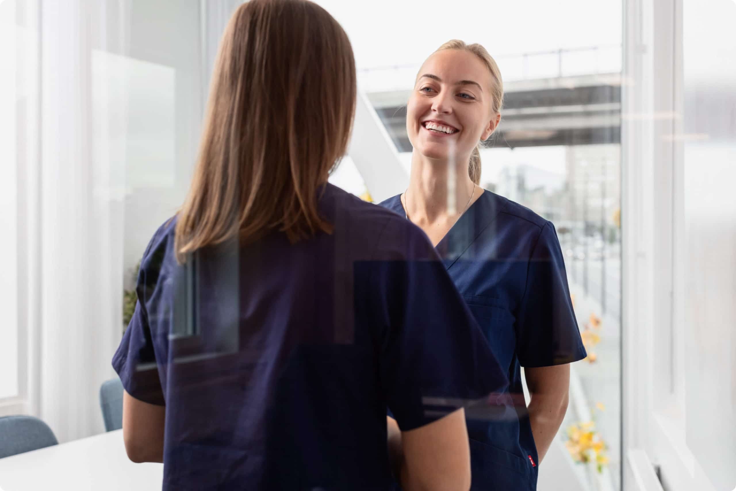 Smiling OneLab nurses ready to carry out health examinations on site at the workplace